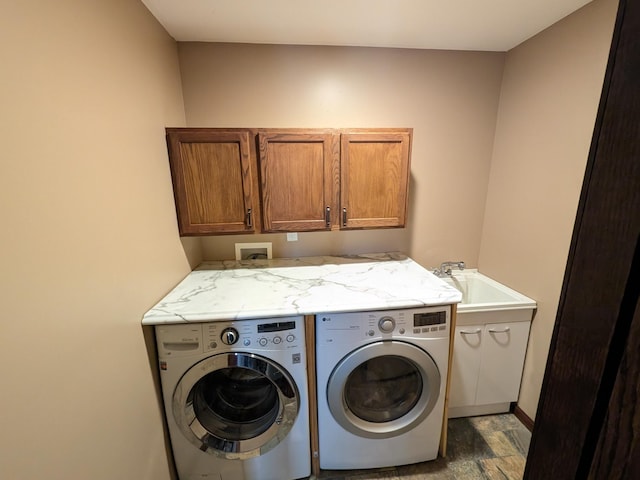 580 Canyon Ln NW, Eyota, MN 55934 - laundry area featuring cabinet space, separate washer and dryer, and baseboards