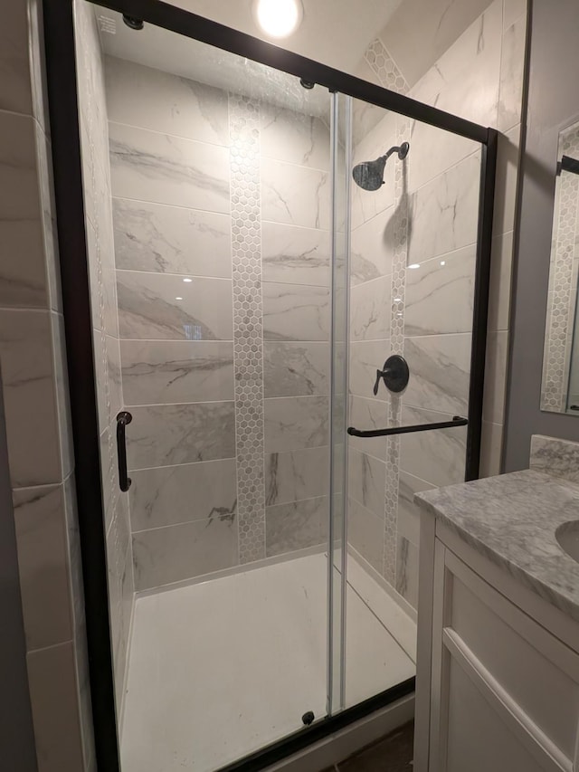 580 Canyon Ln NW, Eyota, MN 55934 - bathroom featuring vanity and a shower stall