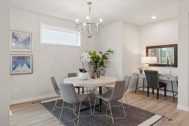 12439 Drayton Trl, Apple Valley, MN 55124 - dining space featuring a chandelier, wood finished floors, and recessed lighting