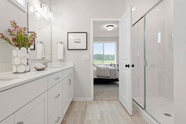 12439 Drayton Trl, Apple Valley, MN 55124 - bathroom featuring double vanity, ensuite bath, and a shower stall