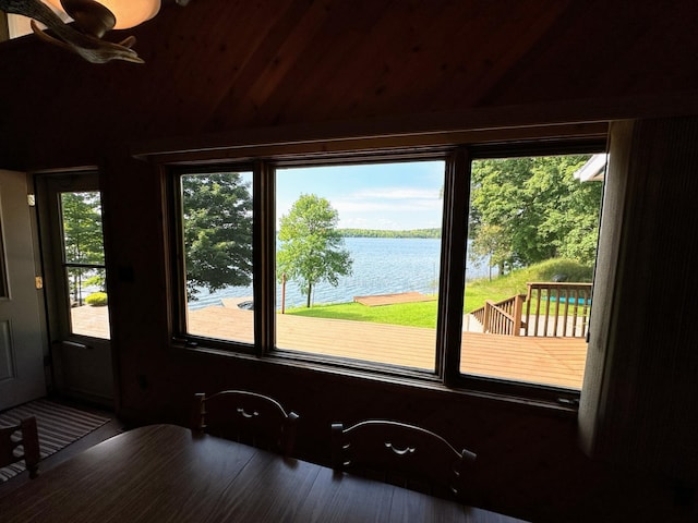 interior space featuring a water view and a wealth of natural light