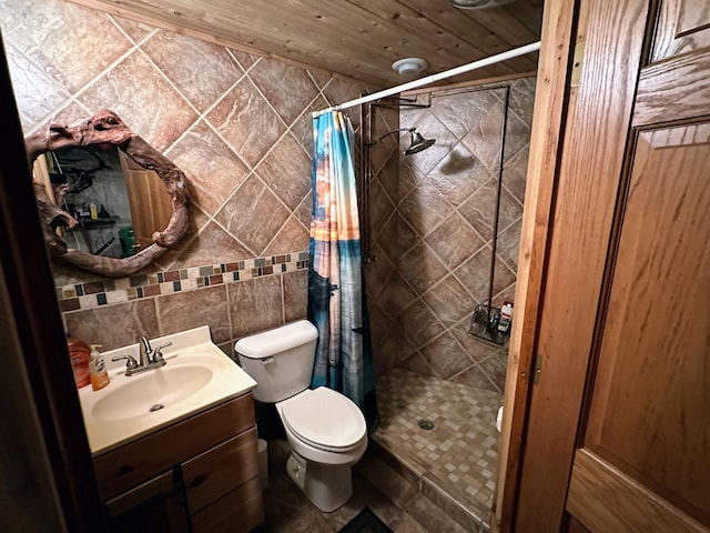 bathroom with toilet, tile walls, a shower stall, and vanity