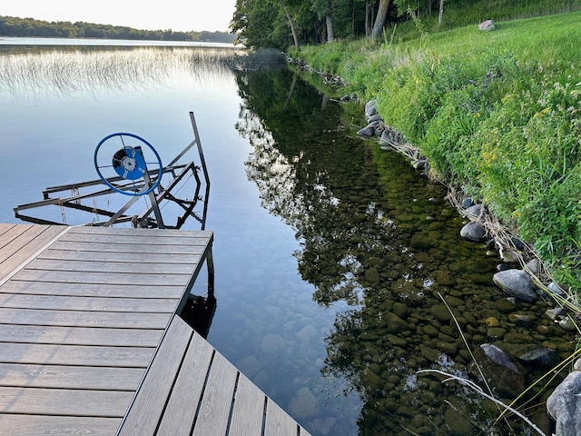 view of dock with a water view