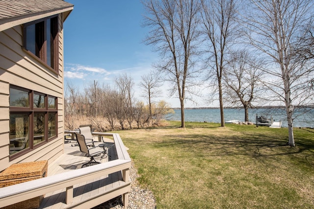 1844 Mount Carmel Dr NE, Alexandria, MN 56308 - view of yard featuring a deck with water view