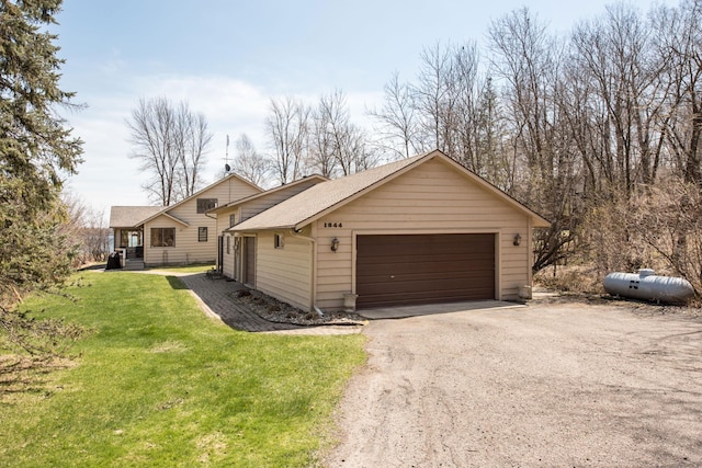 1844 Mount Carmel Dr NE, Alexandria, MN 56308 - view of front of property with a front yard, a shingled roof, and a garage