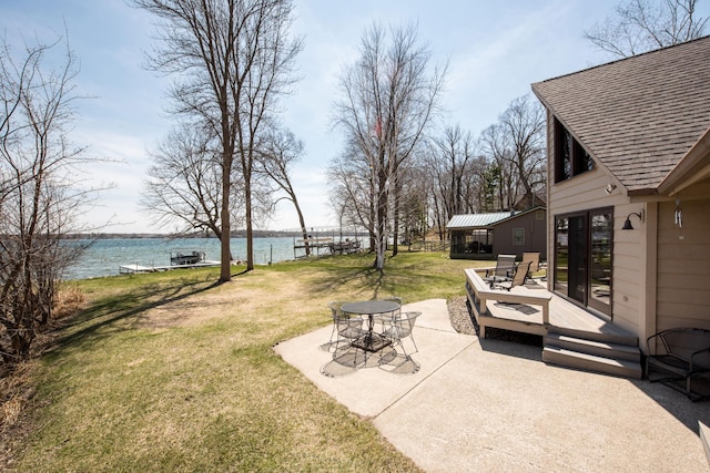 1844 Mount Carmel Dr NE, Alexandria, MN 56308 - view of yard featuring a patio and a deck with water view