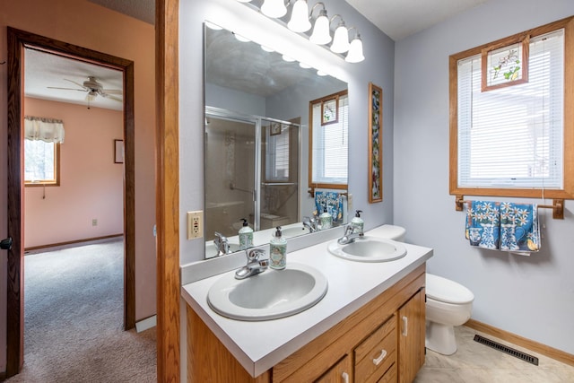 1844 Mount Carmel Dr NE, Alexandria, MN 56308 - bathroom with a stall shower, toilet, visible vents, and a sink