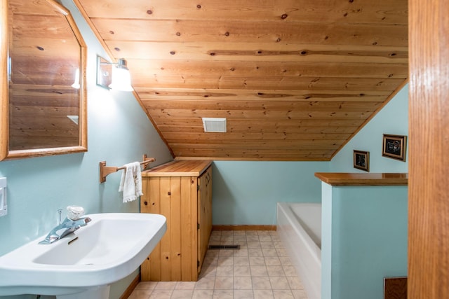 1844 Mount Carmel Dr NE, Alexandria, MN 56308 - full bathroom featuring lofted ceiling, wooden ceiling, a sink, and a washtub