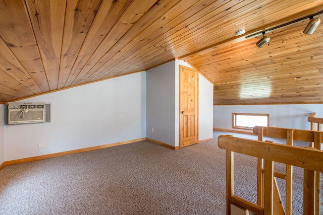 1844 Mount Carmel Dr NE, Alexandria, MN 56308 - additional living space with vaulted ceiling, wood ceiling, carpet floors, and a wall mounted AC