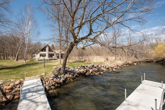 1844 Mount Carmel Dr NE, Alexandria, MN 56308 - view of dock featuring a water view and a lawn