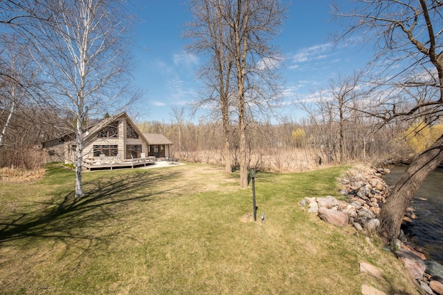 1844 Mount Carmel Dr NE, Alexandria, MN 56308 - view of yard with a wooden deck