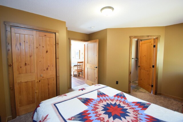 3585 Rigby Rd, Webster, WI 54893 - carpeted bedroom with baseboards and a closet