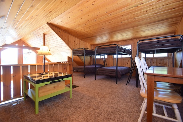 3585 Rigby Rd, Webster, WI 54893 - carpeted bedroom with wood walls, wood ceiling, and lofted ceiling