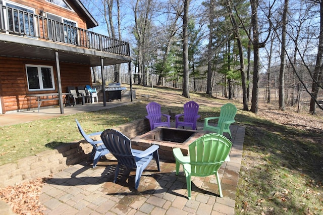 3585 Rigby Rd, Webster, WI 54893 - view of patio / terrace featuring an outdoor fire pit