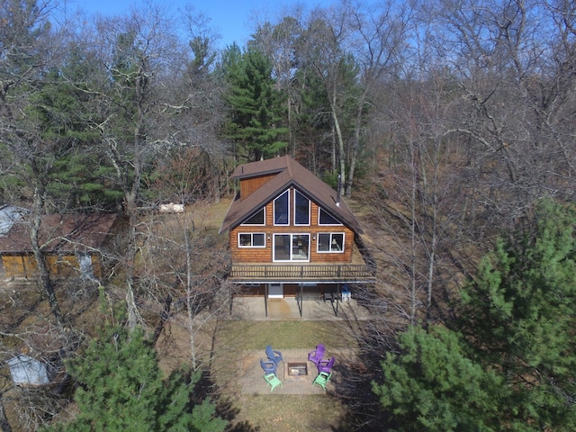 3585 Rigby Rd, Webster, WI 54893 - back of house with a wooded view