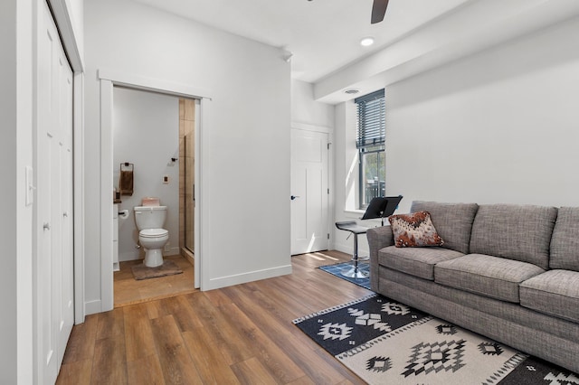 517 2nd St Unit 303, Hudson, WI 54016 - living area featuring wood finished floors, ceiling fan, baseboards, and recessed lighting