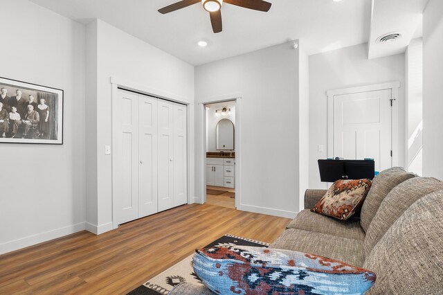 517 2nd St Unit 303, Hudson, WI 54016 - sitting room featuring a ceiling fan, light wood-style floors, baseboards, and recessed lighting
