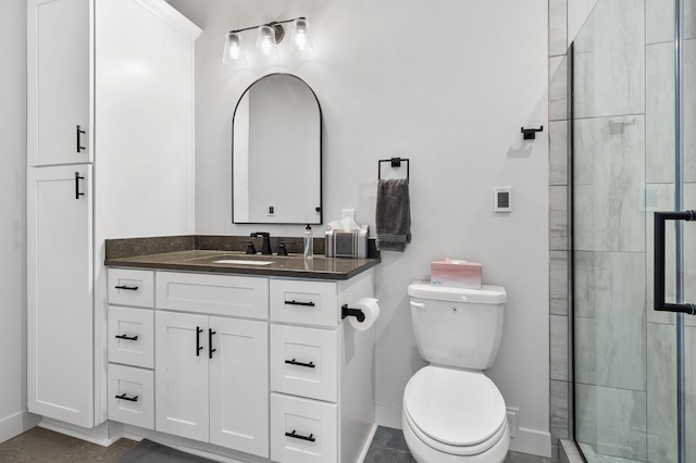 517 2nd St Unit 303, Hudson, WI 54016 - bathroom with toilet, vanity, tiled shower, and baseboards