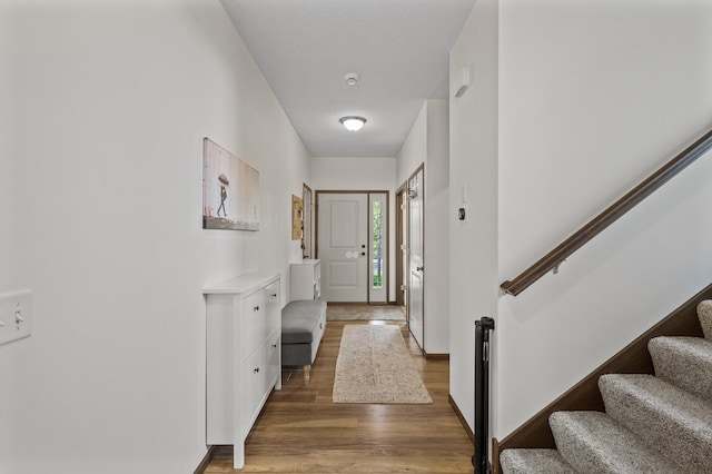 2895 Thunder Bay Ct, Little Canada, MN 55117 - foyer entrance featuring wood finished floors and stairs