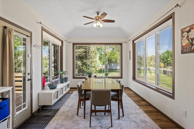 2895 Thunder Bay Ct, Little Canada, MN 55117 - sunroom featuring wood finished floors, french doors, lofted ceiling, and a textured ceiling