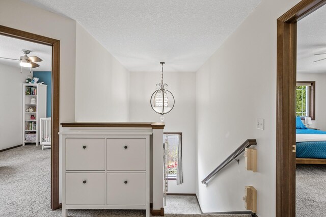 2895 Thunder Bay Ct, Little Canada, MN 55117 - foyer with carpet flooring, ceiling fan, and a textured ceiling