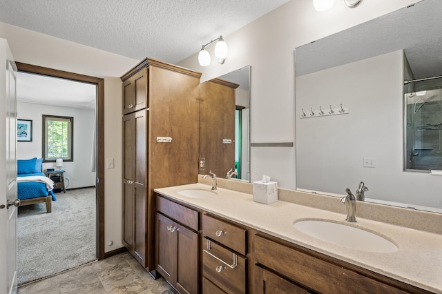 2895 Thunder Bay Ct, Little Canada, MN 55117 - ensuite bathroom with double vanity and a textured ceiling