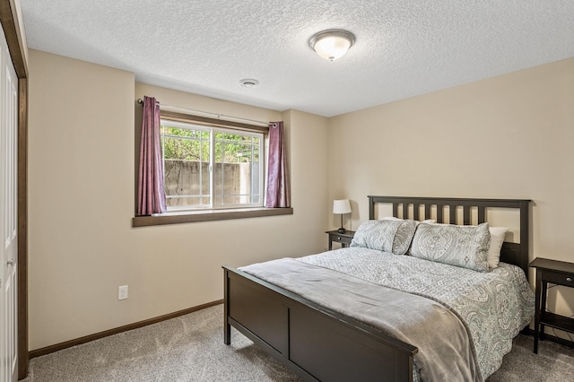 2895 Thunder Bay Ct, Little Canada, MN 55117 - carpeted bedroom featuring a textured ceiling and baseboards