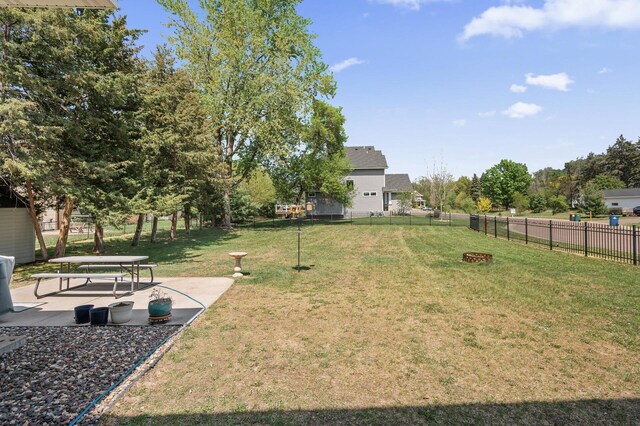 2895 Thunder Bay Ct, Little Canada, MN 55117 - view of yard featuring a patio