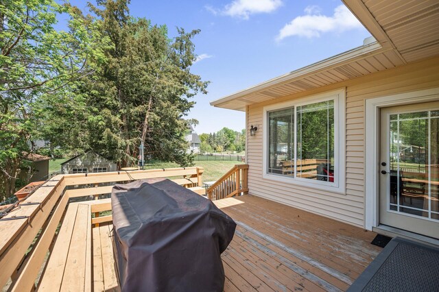 2895 Thunder Bay Ct, Little Canada, MN 55117 - wooden terrace featuring a grill