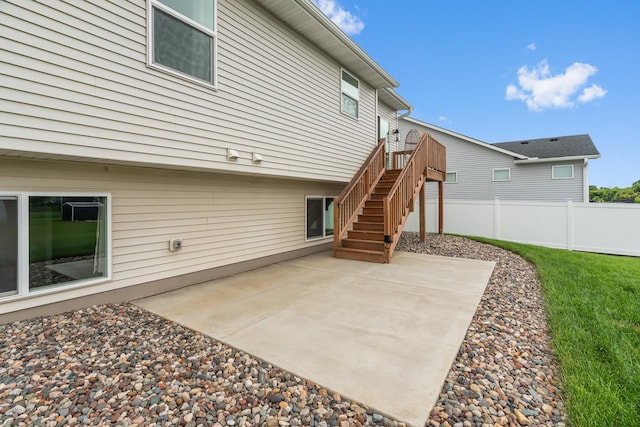 1581 Philipp Way, Shakopee, MN 55379 - back of property featuring stairway, a patio area, and a deck