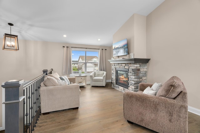 1581 Philipp Way, Shakopee, MN 55379 - living room featuring a stone fireplace, wood finished floors, and recessed lighting