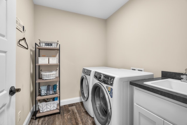 1581 Philipp Way, Shakopee, MN 55379 - washroom with washing machine and clothes dryer, dark wood-style floors, and cabinet space