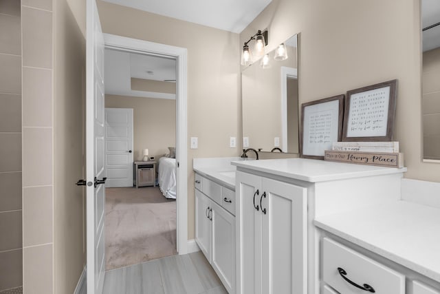1581 Philipp Way, Shakopee, MN 55379 - ensuite bathroom with vanity and wood finished floors