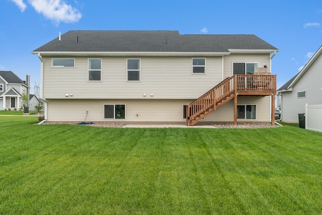 1581 Philipp Way, Shakopee, MN 55379 - back of property with stairs, a lawn, a wooden deck, and roof with shingles