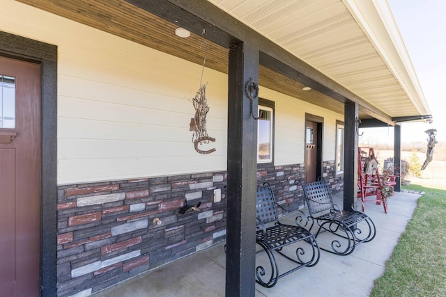 view of patio featuring a porch