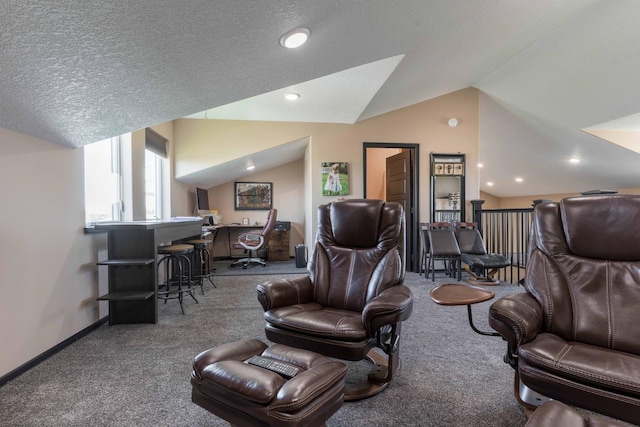 carpeted living room with baseboards and vaulted ceiling