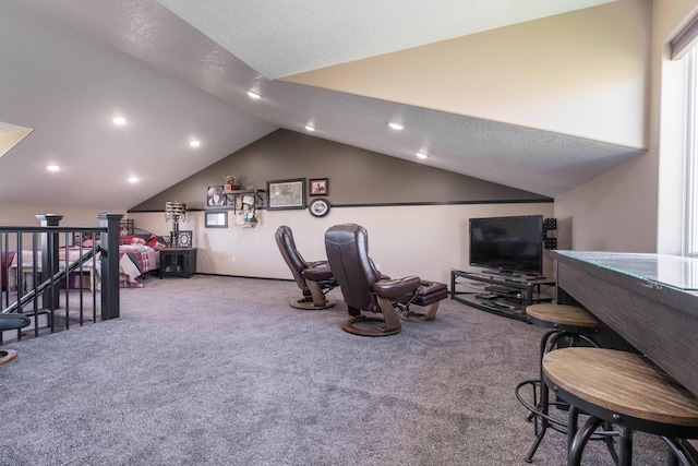 interior space featuring carpet floors, recessed lighting, a textured ceiling, and lofted ceiling