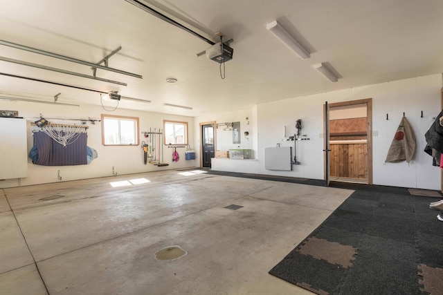 garage featuring a garage door opener