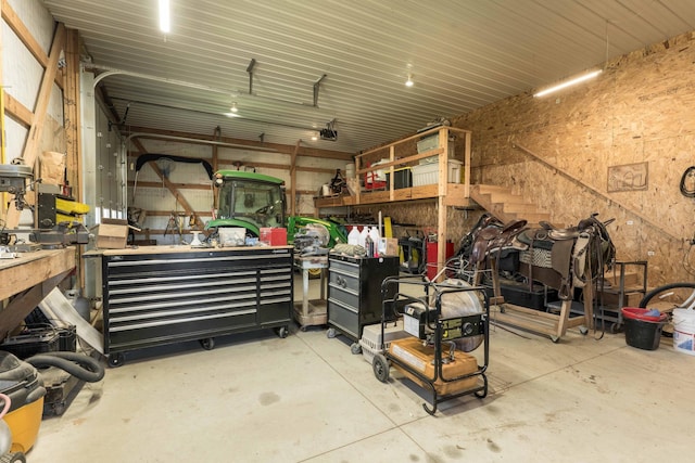 garage with a workshop area