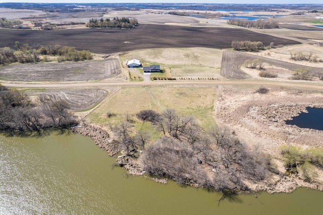 aerial view with a water view and a rural view