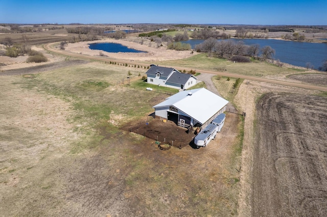 drone / aerial view with a water view and a rural view