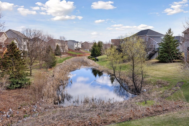 view of water feature with a residential view