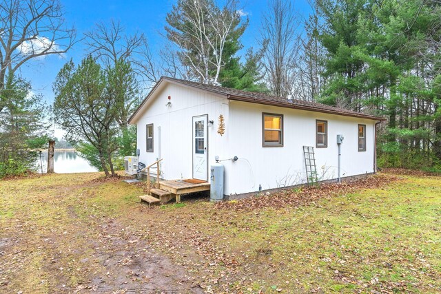 23245 County Rd W, Grantsburg, WI 54840 - rear view of property with a water view and ac unit