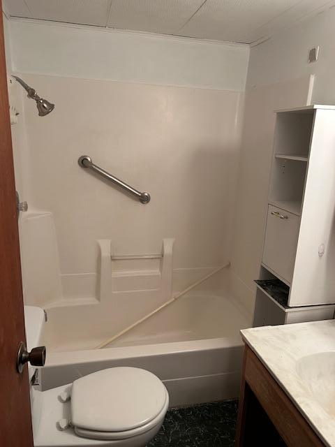 10010 Lake Rd, Watab Twp, MN 56367 - bathroom featuring shower / bathtub combination, toilet, and vanity