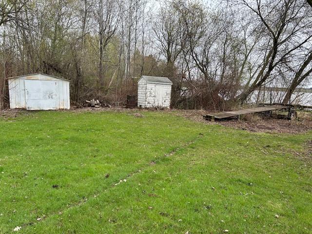 10010 Lake Rd, Watab Twp, MN 56367 - view of yard with an outbuilding and a shed