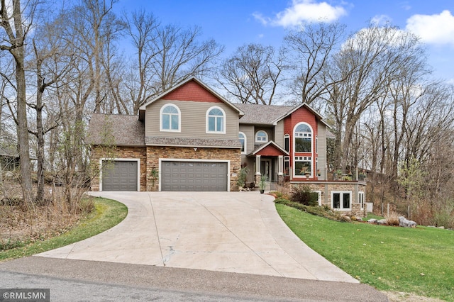 craftsman-style home featuring roof with shingles, a garage, a front lawn, concrete driveway, and stone siding