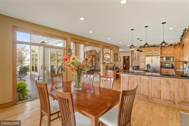 dining area with recessed lighting, baseboards, light wood finished floors, and visible vents