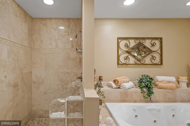 bathroom with a whirlpool tub, recessed lighting, and tiled shower