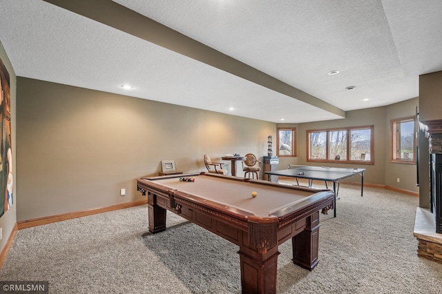 playroom with baseboards, billiards, a textured ceiling, and light carpet