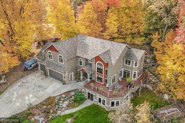 aerial view featuring a view of trees